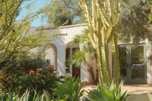 Spanish-style home with desert landscaping