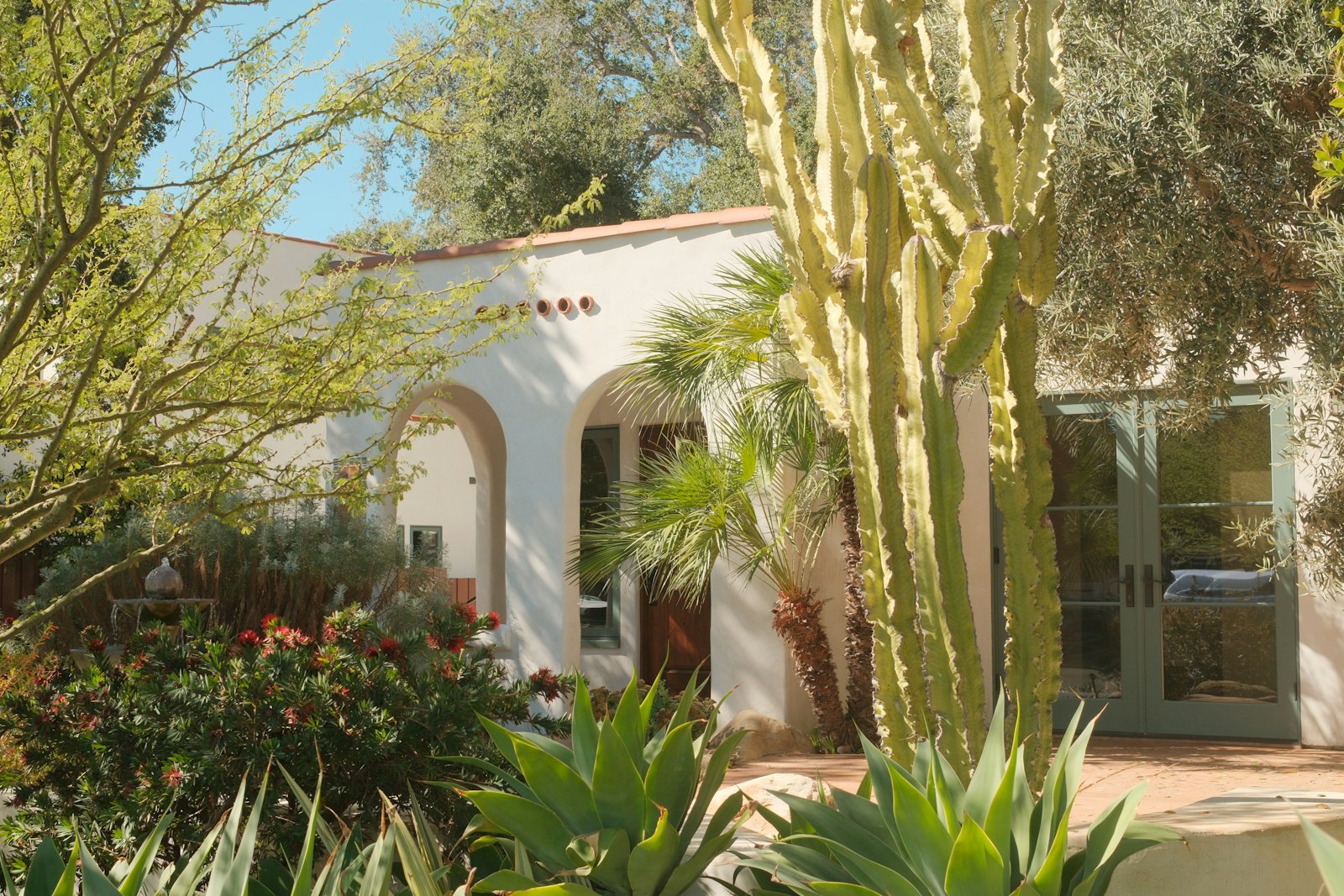Spanish-style home with desert landscaping