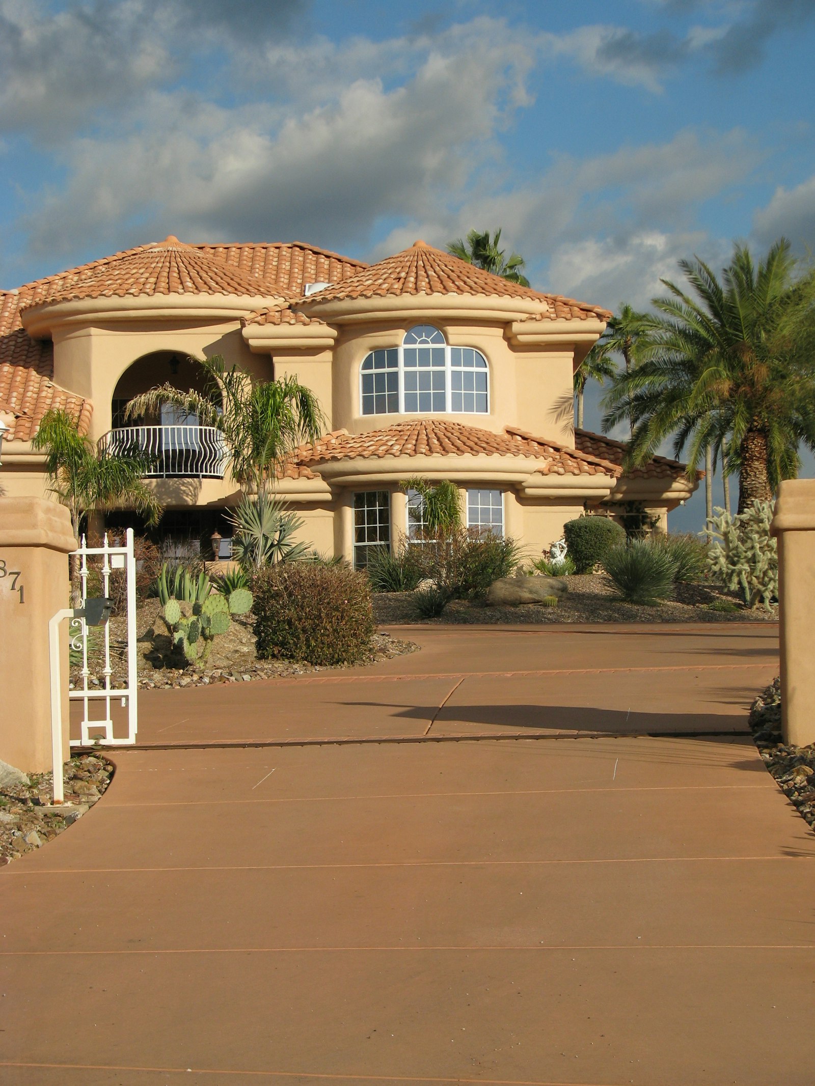 Two-story desert home with Southwest landscaping